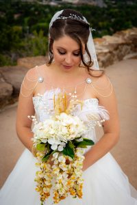 bride with bouquet and veil