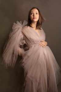 studio maternity portrait in couture maternity gown