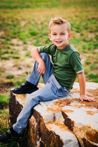 little boy smiling at camera